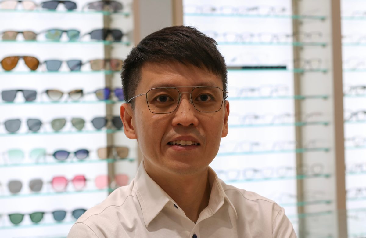 Shawn Au, founder and optometrist of EMME Visioncare, seeing patients at The Cathay by appointment